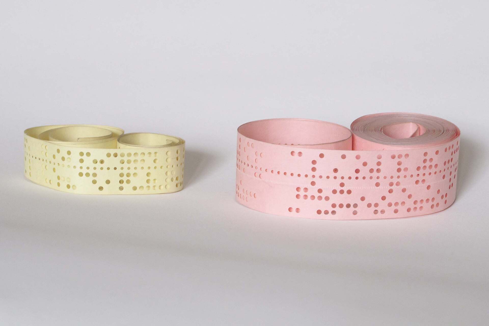 Paper tape: eight tracks for data, five for the teletype